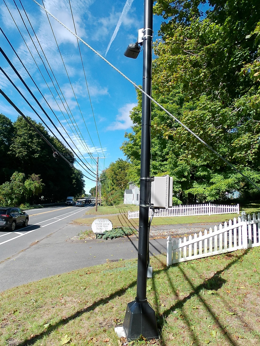 A Motorola ALPR pointed toward Route 20, at the East Wilbraham Cemetery entrance, September 2026.